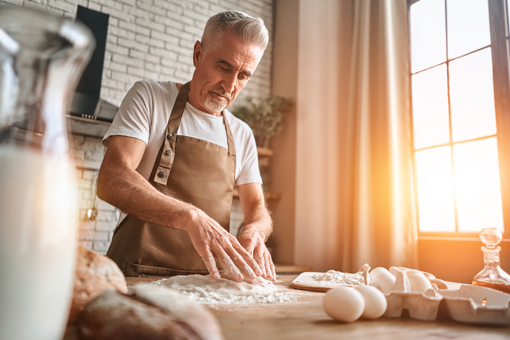 Senior man baking